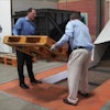 The event was marked by a ceremonial pallet drop into the facility's wood shredder.
