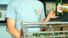 Sarah Chamberlain from Ale-8-One gives journalists a presentation on Kentucky’s most popular soft drink.