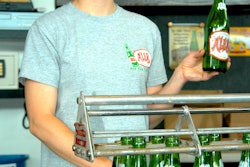 Sarah Chamberlain from Ale-8-One gives journalists a presentation on Kentucky’s most popular soft drink.