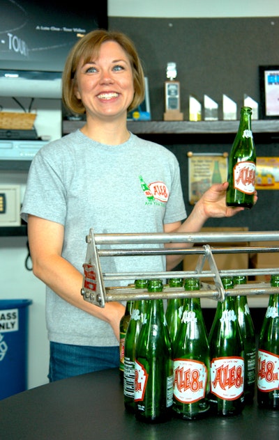 Sarah Chamberlain from Ale-8-One gives journalists a presentation on Kentucky’s most popular soft drink.
