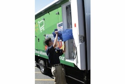an_associate_loads_a_truck_for_walmart_to_go_home_delivery