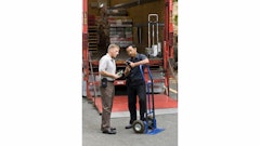 A foodservice driver provides Airclic proof of delivery using an Intermec handheld.