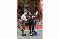 A foodservice driver provides Airclic proof of delivery using an Intermec handheld.