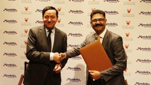 Bahrain's Minister of Industry & Commerce, Dr. Hassan Fakhro and Vishal Tikku, Mondelez International's Area Vice President for the Middle East.
