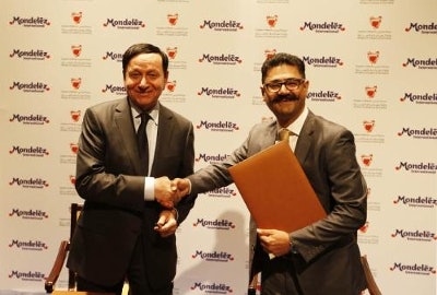 Bahrain's Minister of Industry & Commerce, Dr. Hassan Fakhro and Vishal Tikku, Mondelez International's Area Vice President for the Middle East.