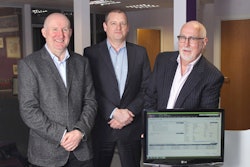 Axida Director Wayne Holgate, left, joins William Salter, CEO and president, Paragon Software Systems, and Len Robinson of Axida.