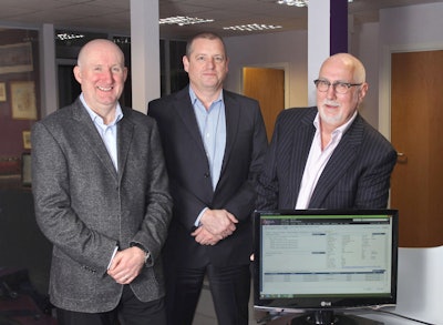 Axida Director Wayne Holgate, left, joins William Salter, CEO and president, Paragon Software Systems, and Len Robinson of Axida.