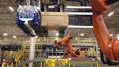 Robots build pallets at the Coca Cola Co. warehouse in Grand Rapids, Mich.