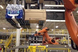 Robots build pallets at the Coca Cola Co. warehouse in Grand Rapids, Mich.