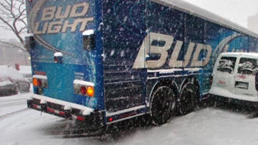 File photo from a 2011 snow storm in Boulder, Colo., involving delivery vehicles.