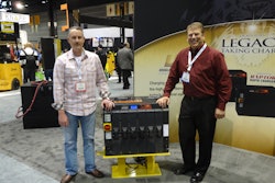Brian Faust, right, of Douglas Battery shows the Douglas Raptor to Steve Duerr of Minnesota Industrial Battery in Roseville, Minn. at the Promat Show.