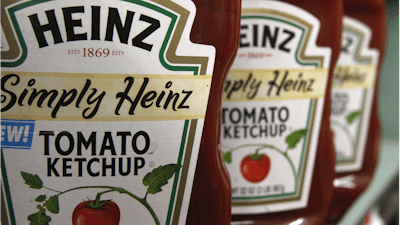 File Photo. H.J. Heinz Co. is buying Kraft Foods Group Inc., creating what the companies say will be the third-largest food and beverage company in North America, the companies announced Wednesday, March 25, 2015.