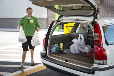 An order is delivered at the Walmart Pickup - Grocery in Bentonville, Ark.