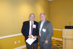 Bud Rodowick of Thermo King, left, and Patrick Brecht of P.E.B. Commodities, Inc. point out problems with the FSMA sanitary transport rule.