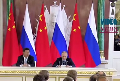 Russian President Vladimir Putin (right) and Chinese President Xi Jinping hold a joint press conference after signing a joint statement in the Kremlin on May 8, 2015 in Moscow, Russia.