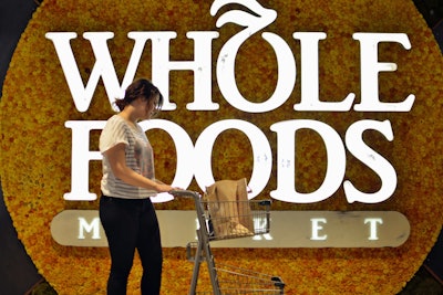 WFM store logo with shopper 554b92323c0be