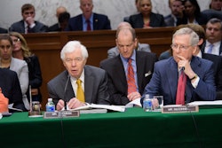 In this file photo Chairman of the Senate Committee on Appropriations Senator Thad Cochran is sitting with committee member Senator Mitch McConnell.