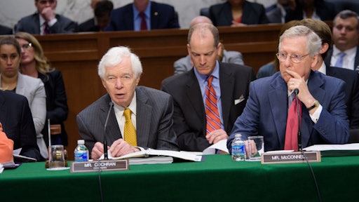 In this file photo Chairman of the Senate Committee on Appropriations Senator Thad Cochran is sitting with committee member Senator Mitch McConnell.