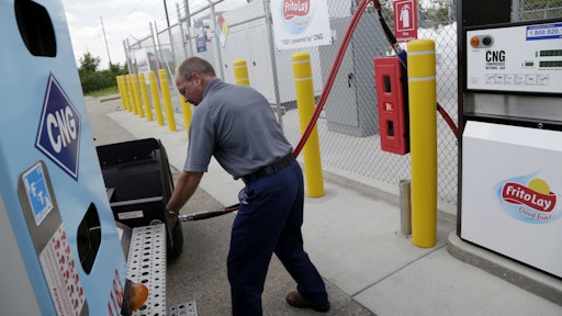 Dan Walsh, a Frito-Lay employee, is seen using Frito-Lay’s CNG fueling station in Beloit, Wis. Frito-Lay Lay hopes to build seven public CNG fueling stations across the U.S., providing fuel for the expanding Frito-Lay fleet, as well as service other companies using alternative fuel vehicles.