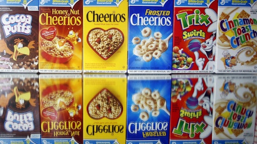 This March 22, 2011 file photo shows boxes of General Mills cereals in Portland, Ore. General Mills on Monday, June 22, 2015 said it is dropping artificial colors and flavors from its cereals, the latest company to respond to a growing desire for food made with ingredients people see as natural.