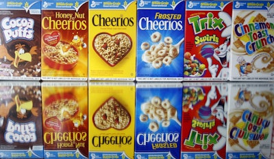 This March 22, 2011 file photo shows boxes of General Mills cereals in Portland, Ore. General Mills on Monday, June 22, 2015 said it is dropping artificial colors and flavors from its cereals, the latest company to respond to a growing desire for food made with ingredients people see as natural.