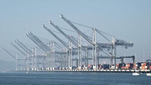 Idle cranes at the Port of Oakland.