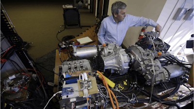 Wrightspeed CEO Ian Wright explains the technology behind a electric-powered engine which will be used for FedEx delivery trucks at the company''s headquarters, Thursday, Feb. 12, 2015, in San Jose , Calif. Wright helped bring electric cars to market when he co-founded Tesla Motors a decade ago. Now he''s targeting trucks that deliver packages, haul trash and make frequent stops on city streets. His company, Wrightspeed, makes electric powertrains that can be installed on commercial trucks, making them more energy-efficient.