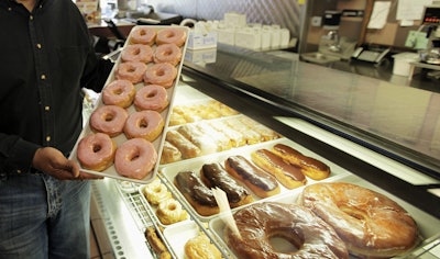 The Food and Drug Administration says Americans still eat about a gram of trans fat every day, and phasing it out could prevent 20,000 heart attacks and 7,000 deaths each year.