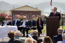 Georgia Gov. Nathan Deal, right, announces a Memorandum of Agreement to establish the Appalachian Regional Port near Chatsworth, Ga., along with, from right, Murray County Commissioner Brittany Pittman, Georgia Ports Authority Executive Director Curtis Foltz, CSX Senior Vice President Clarence Gooden, Ga. Senator Charlie Bethel, and Ga. House Speaker David Ralston, Tuesday, July 28, 2015, in Chatsworth, Ga. The inland port, due to open in 2018, will serve as a direct link from the Port of Savannah to North Georgia, Alabama, Tennessee and parts of Kentucky.