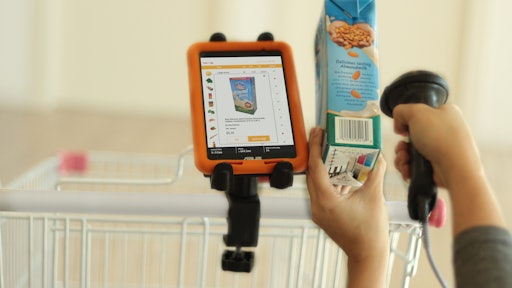 A picker fulfills an online order using the StorePower solution.