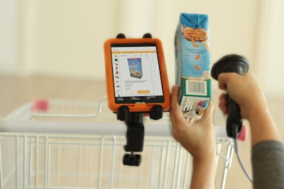 A picker fulfills an online order using the StorePower solution.
