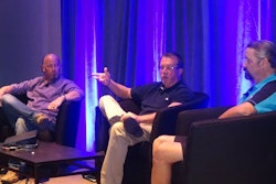 Mark Mullins of Ben E. Keith Foods, center, notes DriveCam’s benefits during the IFDA Solutions Conference in Phoenix, flanked by Mike Hummel of Martin Bros. Co., at left and Danny Duke of Shamrock Food Co., at right.