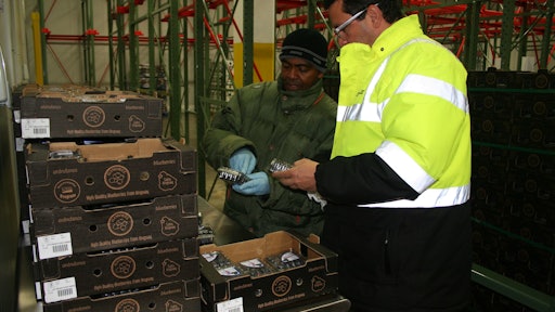 Blueberries from Peru are inspected by Crowley Fresh employees after being cold treated for pests.