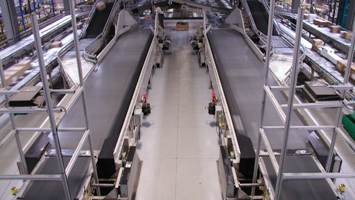 H-E-B supermarkets use Fortna WCS software to manage Automotion pick-to-belt conveyors in a DC.
