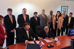 Governor McAuliffe (third from left, back row) and the Port of Virginia delegation witnessing the signing of MOU between the Port of Virginia and the Cuban National Port Authority.