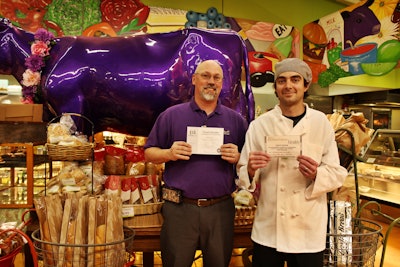Grocery manager/assistant store manager Wade Combs, left, and service deli overseer Greg Boon display their Food Handler Cards.
