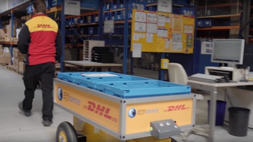EFFiBot sits on four heavy-duty all-terrain wheels, its body is mainly an open wagon-like bay that holds upwards of 650 pounds. Sensors on the front help EFFiBot follow the picker throughout the warehouse as he or she finds packages on the shelves and places them on the robot to carry.