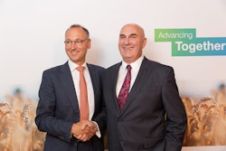 Werner Baumann (left), CEO of Bayer AG, and Hugh Grant (right), Chairman and Chief Executive Officer of Monsanto.