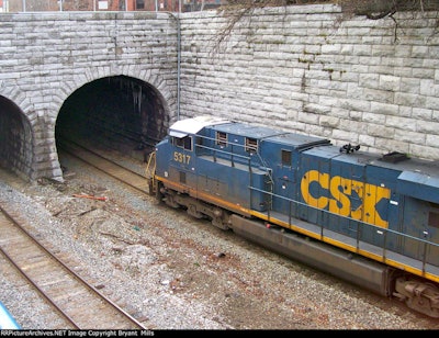 The tunnel, dug in the 1890s, was built to accommodate trains of that era. It does not have enough clearance to allow the passage of double-stacked freight containers, so cargo coming out of the port moves at half the pace that it can leave other facilities.