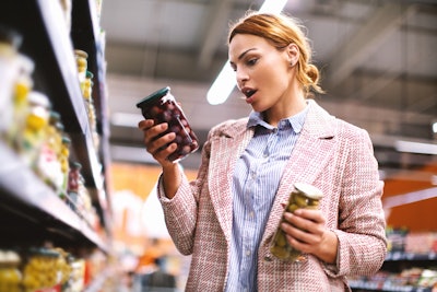 Getty Images 1015953866 Woman In Grocery Store