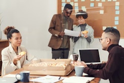 People Having Pizza During Break Time 3184342