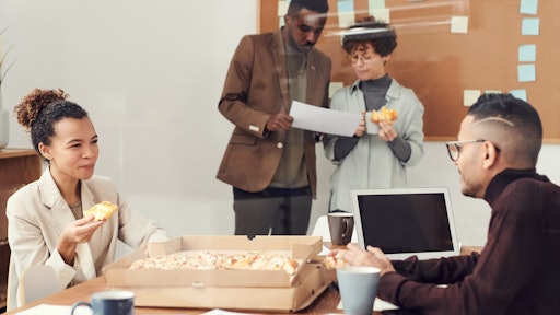 People Having Pizza During Break Time 3184342