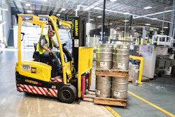 Person Driving Yellow Forklift 1267337
