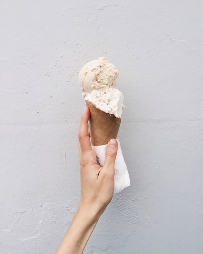 Person Holding Ice Cream 1030941