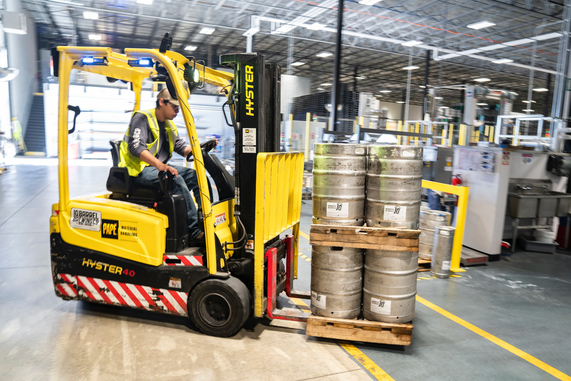 Person Driving Yellow Forklift 1267337