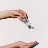 Person Holding Hand Sanitizer 3962332