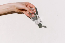Person Holding Hand Sanitizer 3962332