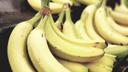Selective Focus Photo Of Bunch Of Bananas On Black Surface 1093038