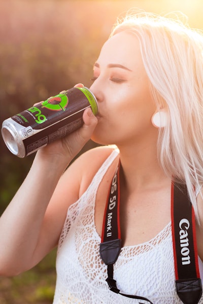 Woman Drinking Tin Can 2018977