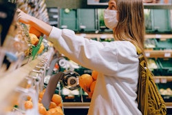 Woman In White Long Sleeve Jacket Shopping For Fruits 3962291